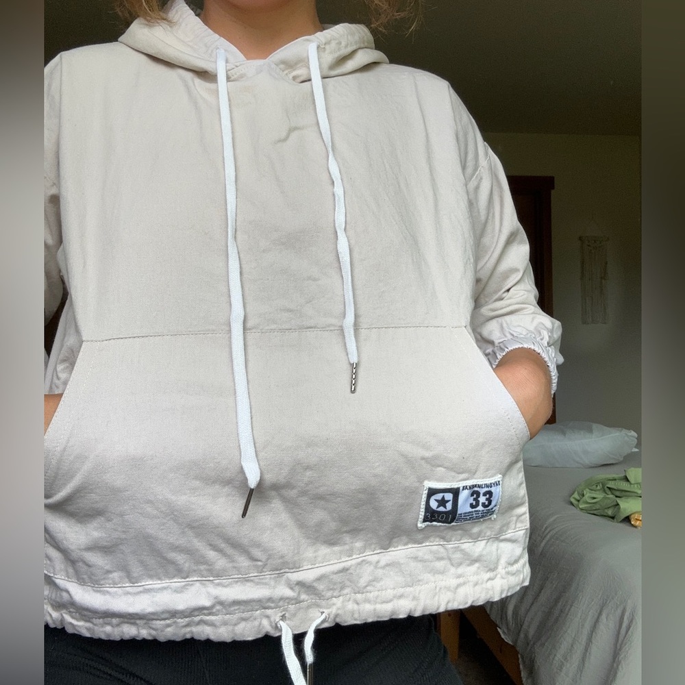 Cute cropped-ish long sleeve with hood and pocket